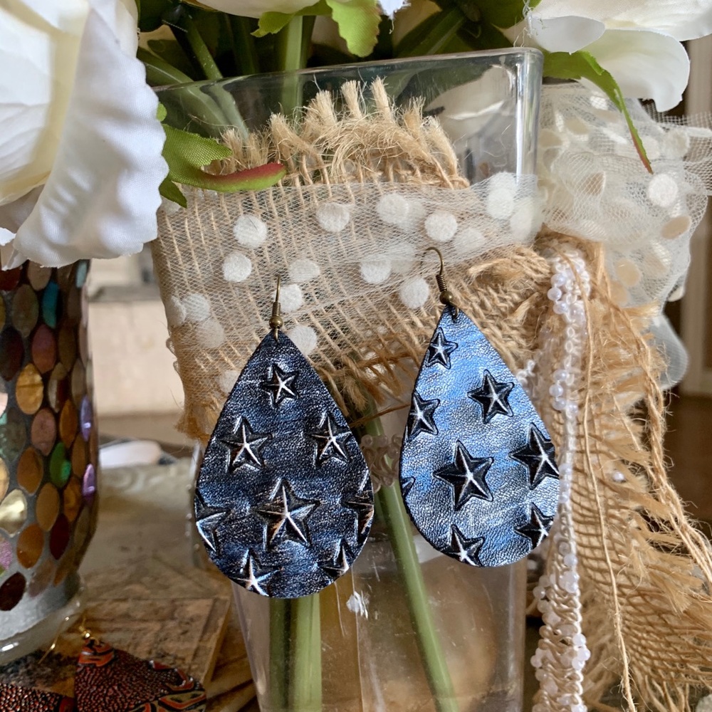 Star spangled silver blue leather earrings.